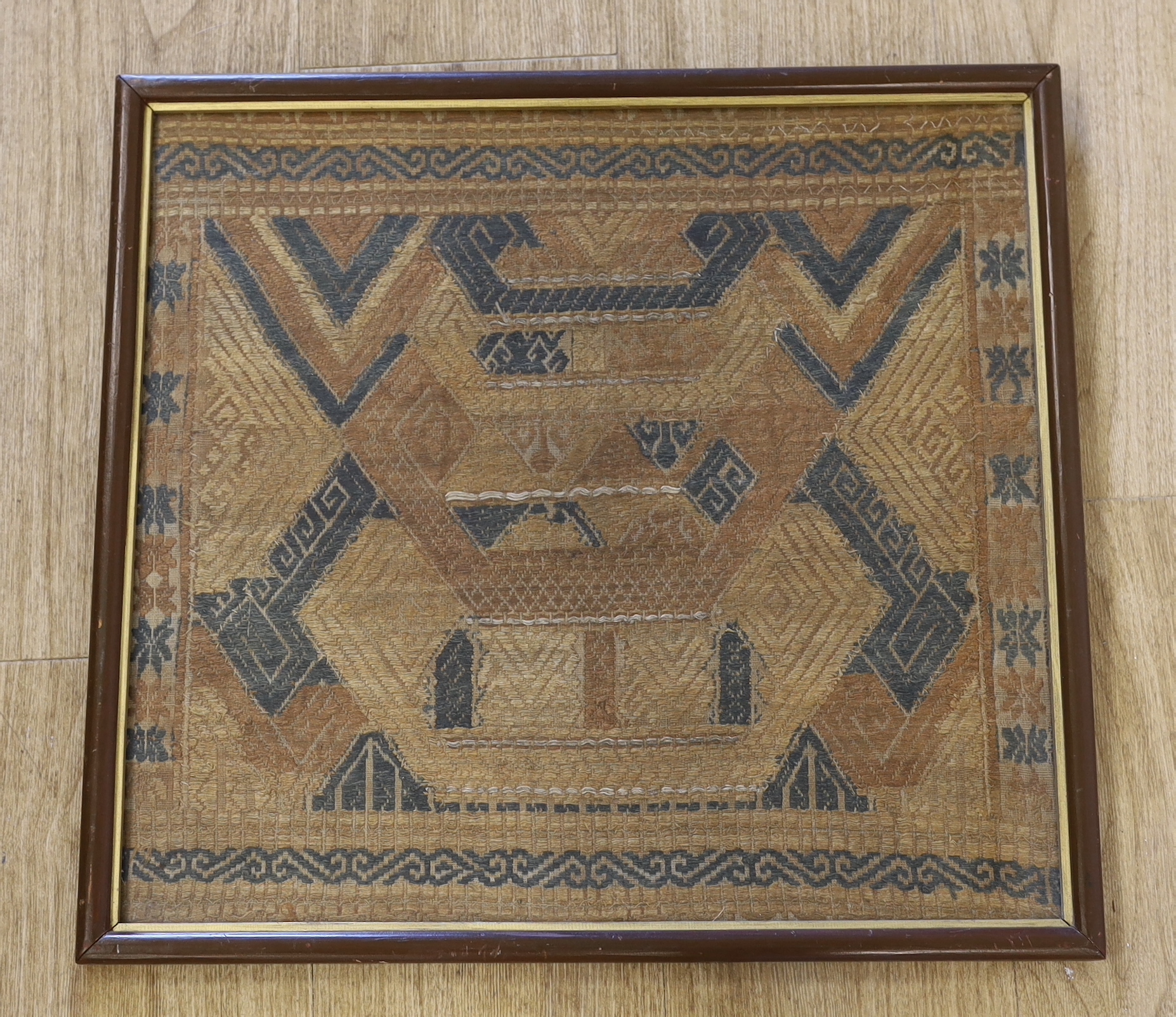 Two Indonesian framed woven panels, largest 44cm wide x 47 high